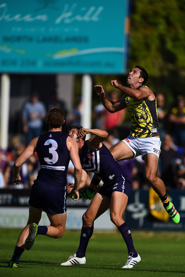 AFL 2016 NAB Challenge - Fremantle v Richmond Troy Chaplin flies high for a mark against Fremantle on Friday night - ${keywords}